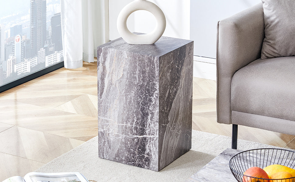 Elevate your living space with this modern MDF coffee table, which showcases gray textured patterns. It is characterized by stylish design.