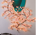 The cherry blossom branches can be customized. The LED tree-shaped lamp is 7.55 feet long and has 148 LEDs. It is suitable for wall decoration and can be used in various festivals and scenarios.